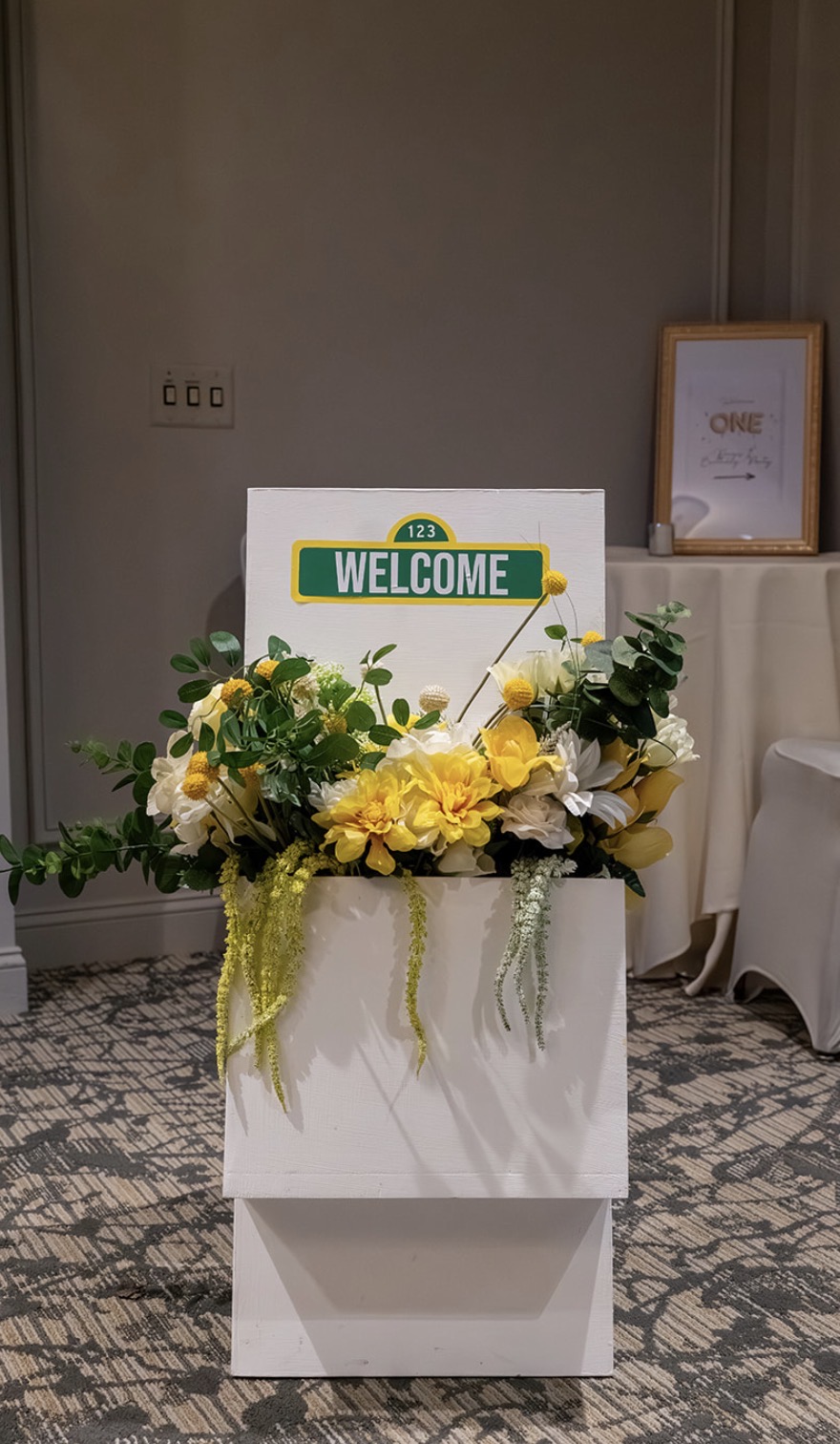 Custom welcome sign with faux flowers